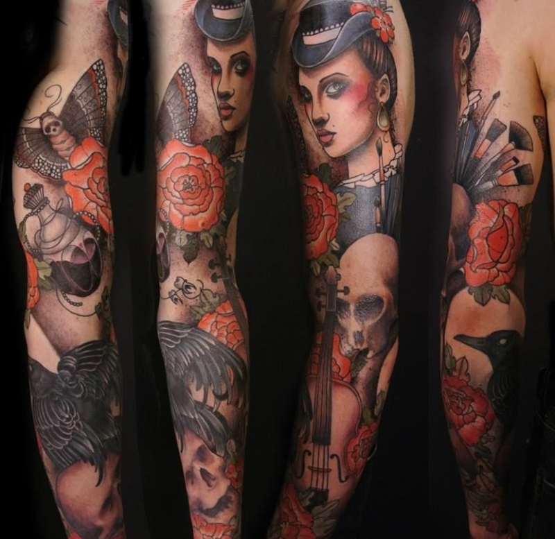 背上的超现实主义剑插双面人头图案纹身