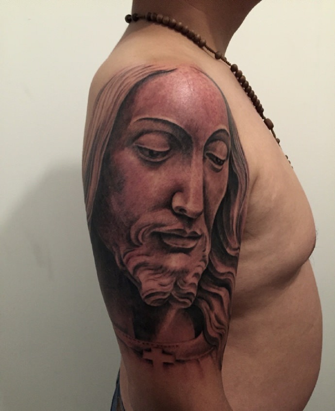 手臂个性威武的耶稣纹身图案