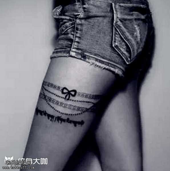 腿部蝴蝶结纹身图案