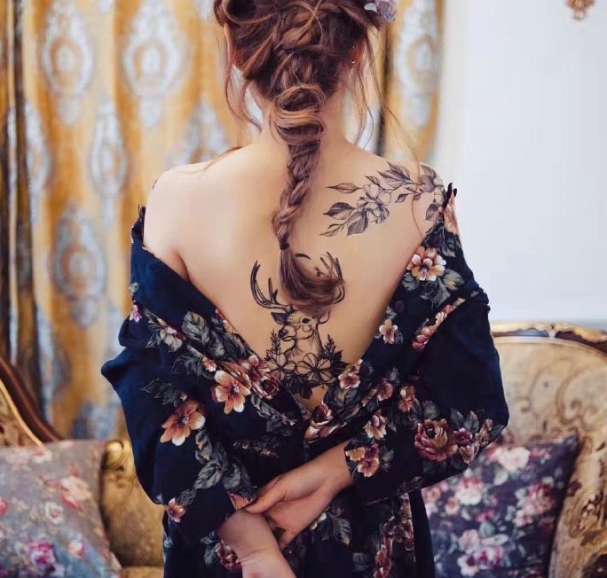 一组非常养颜的美女花朵纹身图案
