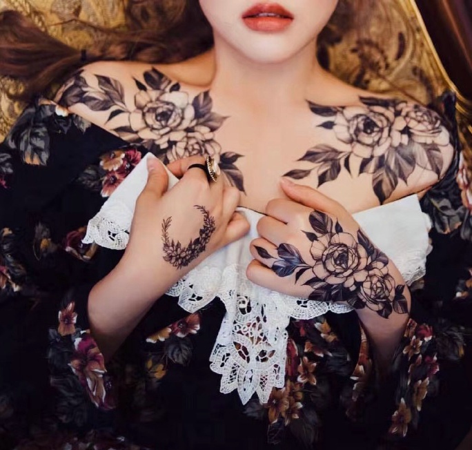 一组非常养颜的美女花朵纹身图案