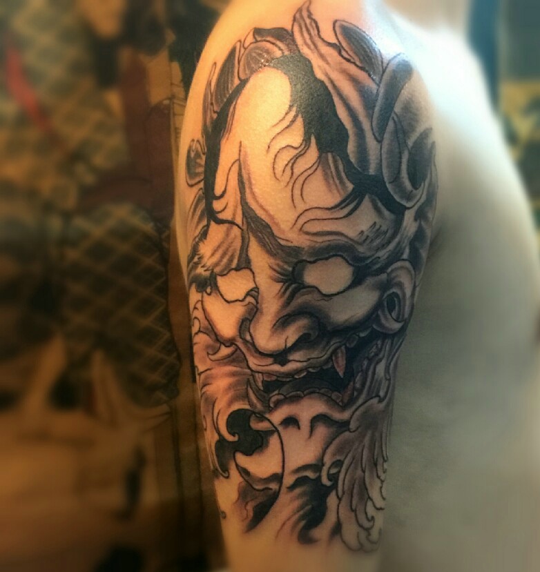 大臂传统十足的小般若纹身图案