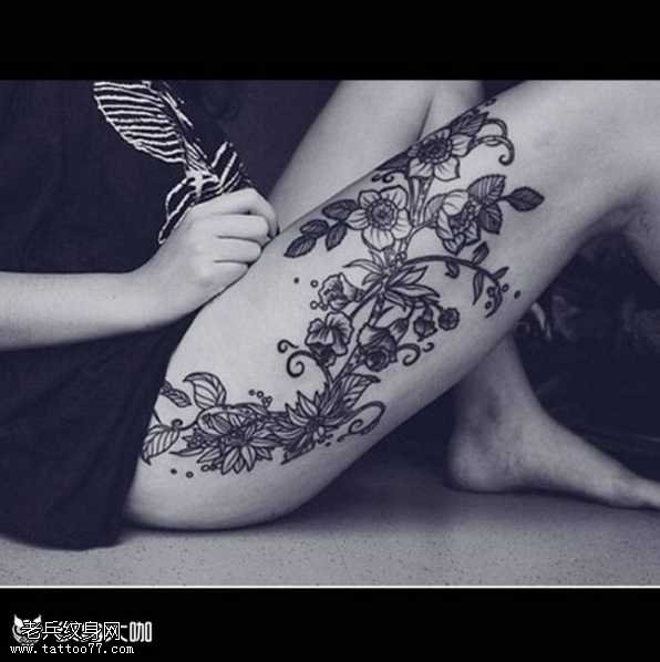 腿部满花朵纹身图案