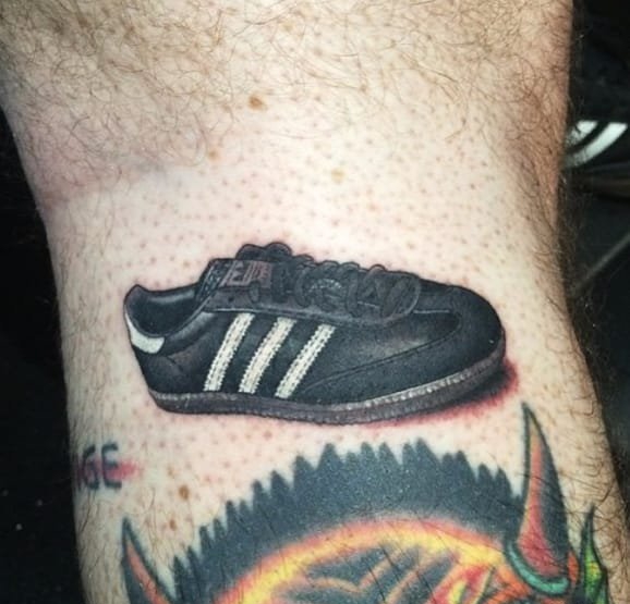 腿部帅气运动鞋纹身图案来自丹史密斯