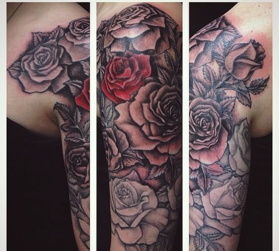 女性手臂上漂亮的玫瑰花纹身图案