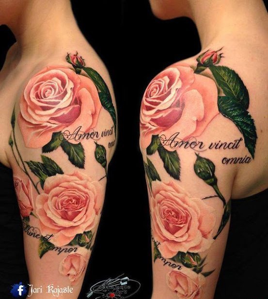 女性手臂上漂亮的玫瑰花纹身图案