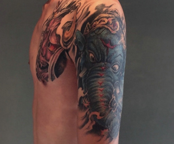 象神与般若结合的半甲纹身图案