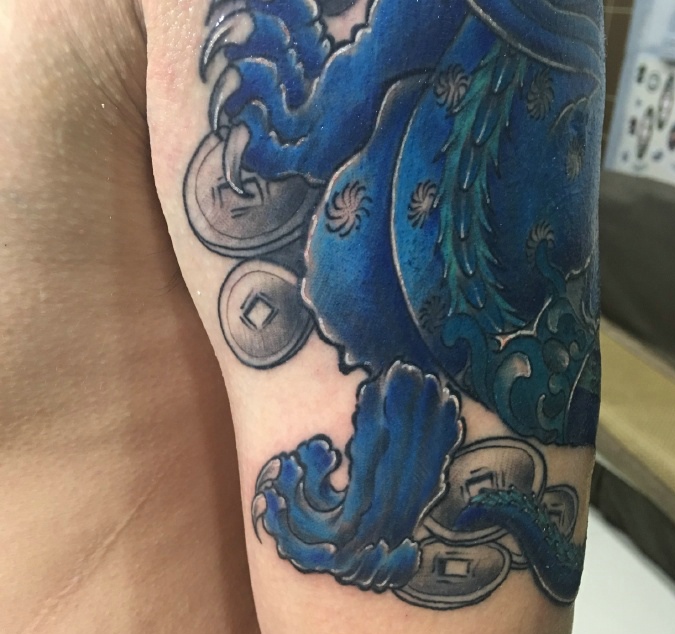 大臂老传统貔貅纹身图案个性十足