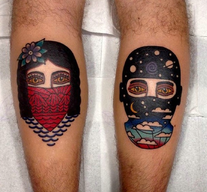 双手臂年轻有活力的彩色图腾纹身图案