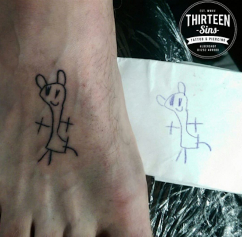 把自己宝宝的画纹在手臂上的纹身图案