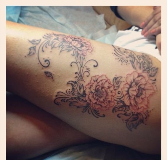 女性大腿上各种样式漂亮的纹身图案