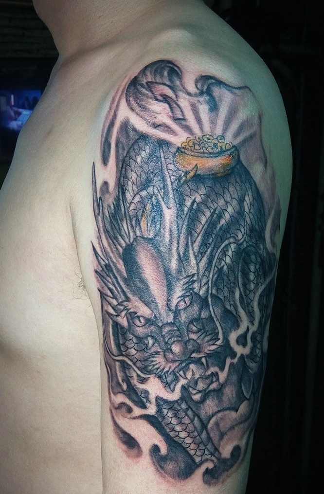 具有男人味的一款手臂邪龙纹身图案