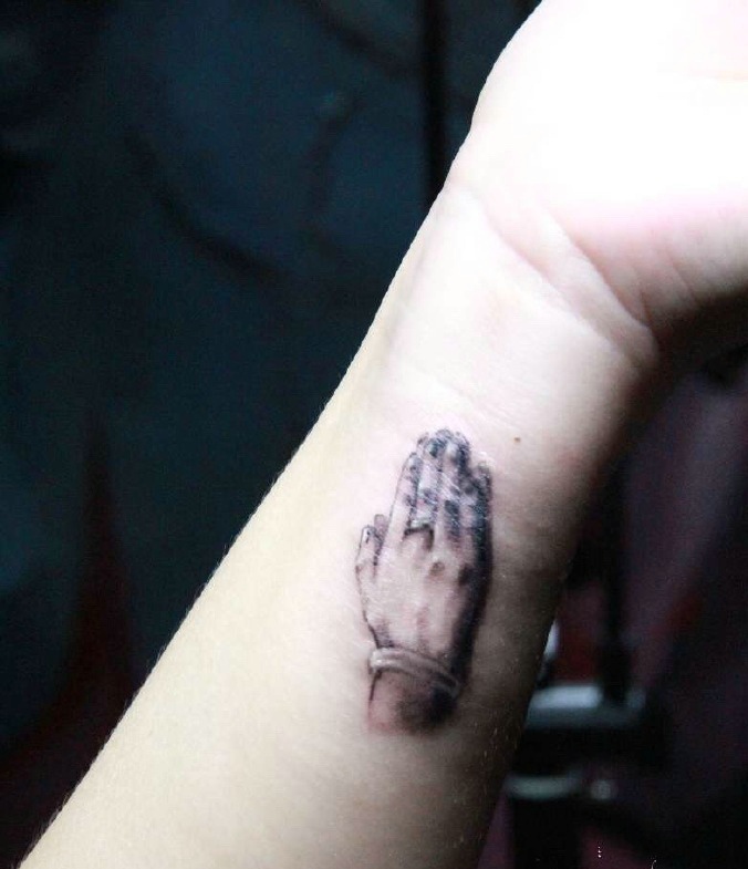 手臂一款有个性的手掌纹身图案