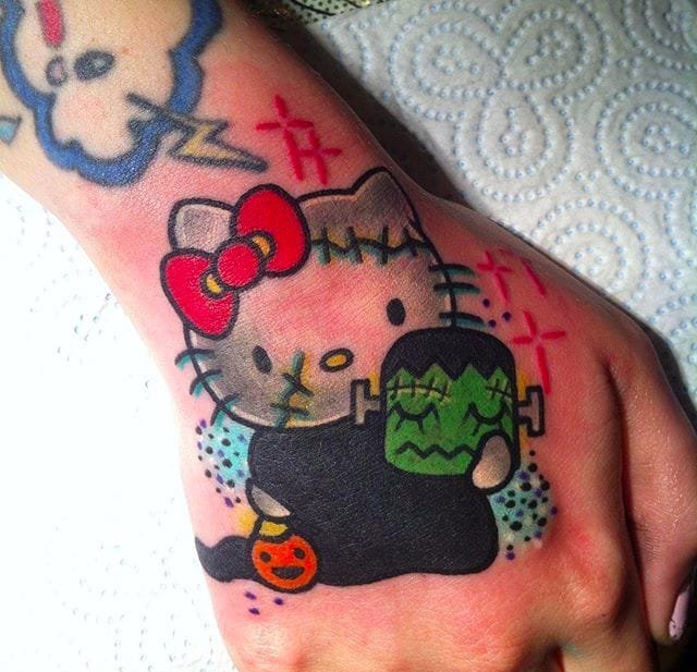 彩色的卡通动物纹身小马驹和凯蒂猫纹身图案