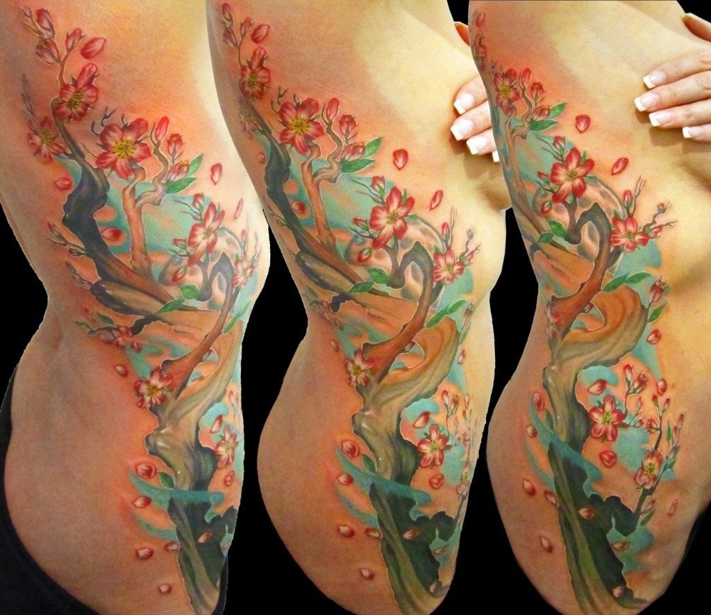 女性喜爱的美丽的樱花纹身图案