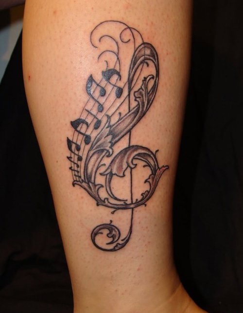 女孩身上美妙的音符纹身图案