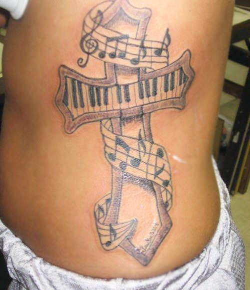 女孩身上美妙的音符纹身图案