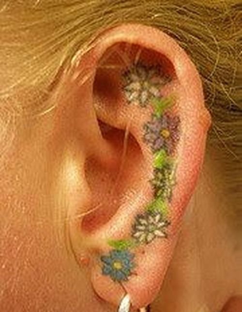 30多款女性身上漂亮的雏菊花纹身图案