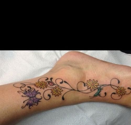 30多款女性身上漂亮的雏菊花纹身图案