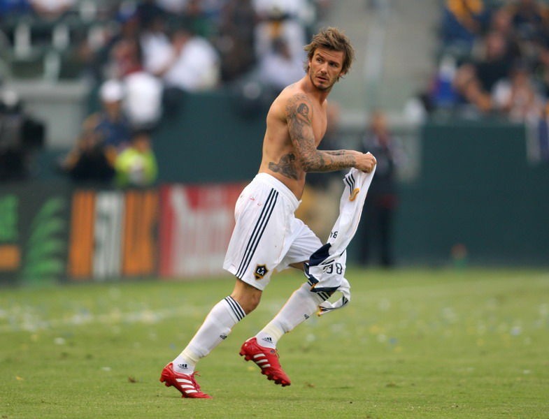 运动健儿手臂美女纹身图片