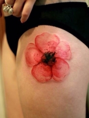大腿红色的花蕊纹身图案