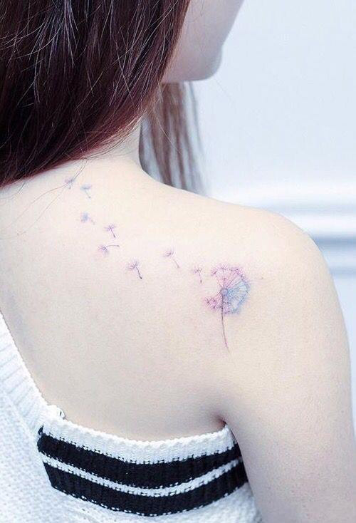 美女披肩七彩蒲公英纹身图案