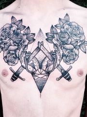 胸部点刺玫瑰花匕首创意纹身图案