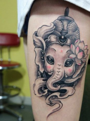 美女大腿可爱时尚的象神纹身图案