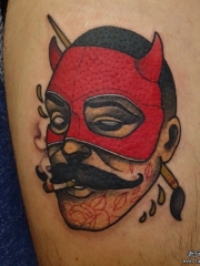 大臂人物魔鬼面具纹身图案