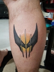 男生腿部金刚狼图腾纹身图片