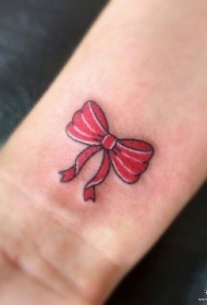 手腕彩色蝴蝶结纹身图案
