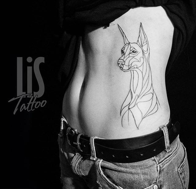 一组生动且活泼的杜宾犬宠物狗纹身动物纹身图案大全