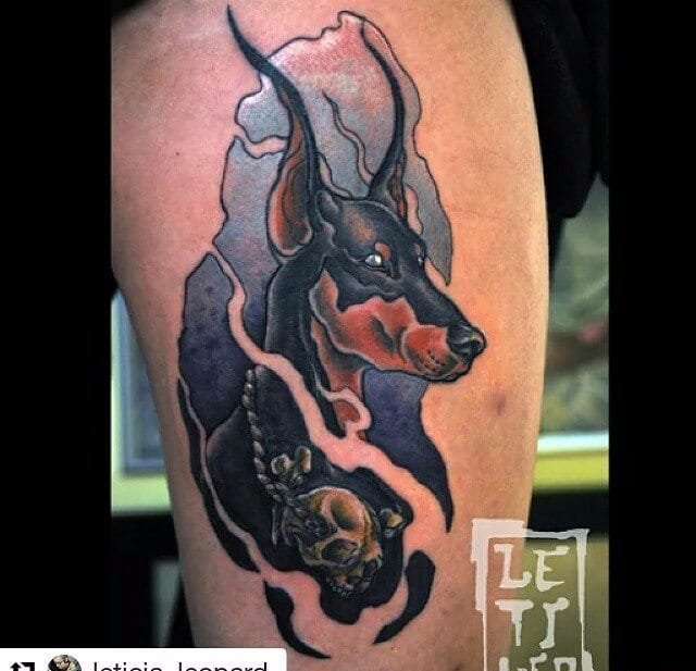 一组生动且活泼的杜宾犬宠物狗纹身动物纹身图案大全