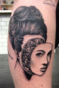 小腿超现实主义风格黑色人脸与机械纹身图案