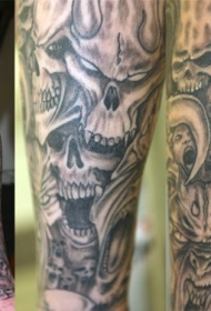 手臂黑色霸气的骷髅纹身图案