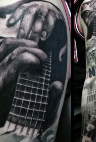 花臂彩色音乐主题的纹身图案