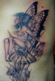 森林精灵坐在蘑菇上纹身图案