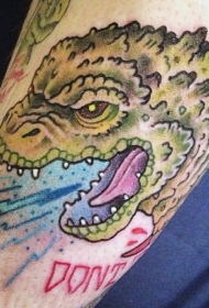 有趣的卡通绿色哥斯拉手臂纹身图案