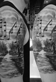 大臂孤独的音乐家与音符风景纹身图案