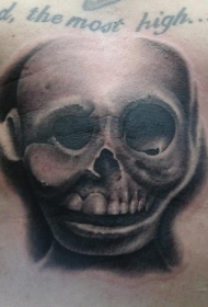 腹部黑灰石雕风的骷髅纹身图片