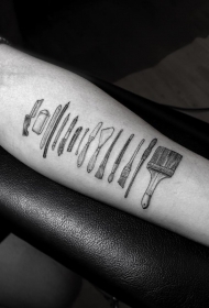 手臂黑色简约的艺术绘画工具纹身图案