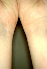 手腕上的小乐符纹身图案