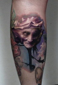 创意设计彩色玫瑰结合老女人脸纹身图案