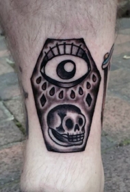 腿部简单的黑白棺材与骷髅眼睛纹身图案
