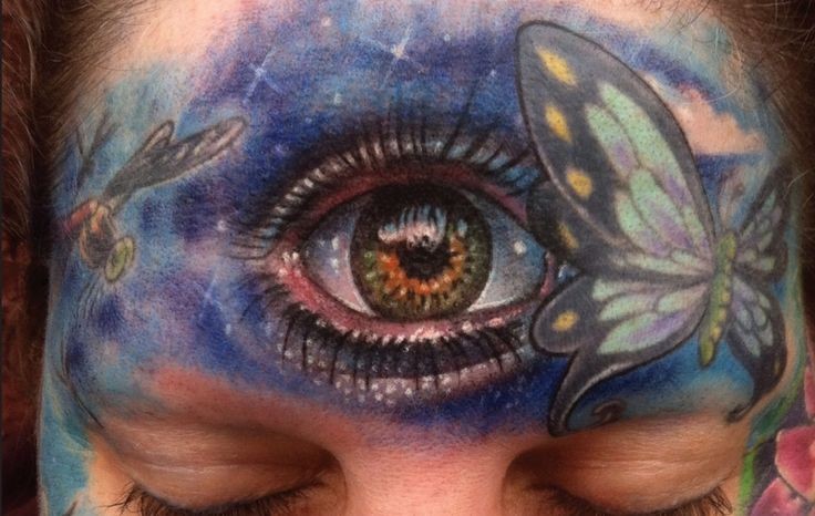 额头大胆的彩绘眼睛蝴蝶蜻蜓纹身图案