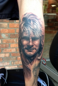 腿部棕色男士肖像纹身图案