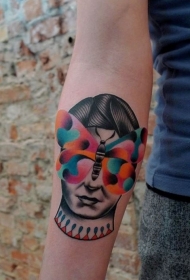 手臂七彩蝴蝶和女性头像纹身图案