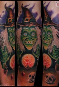彩色卡通女巫与骷髅和魔法球纹身图案