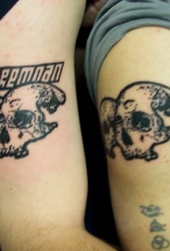 大臂黑色点刺骷髅纹身图案