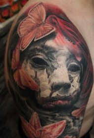 彩色的蝴蝶和花朵恶魔脸纹身图案